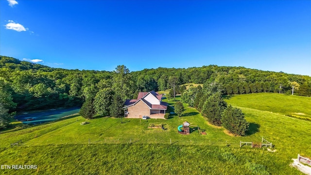1090 Snow Hill Rd, Oakdale, TN 37829 - aerial view of property and surrounding area with a heavily wooded area