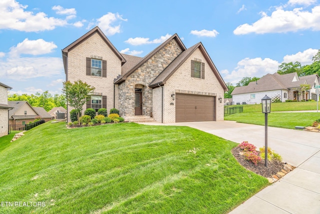9337 Sandy Springs Ln, Knoxville, TN 37922 - view of front facade with brick siding, driveway, a garage, and central air condition unit