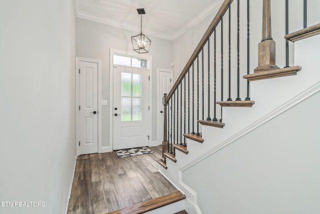 9337 Sandy Springs Ln, Knoxville, TN 37922 - entryway with wood finished floors, a chandelier, stairway, crown molding, and baseboards