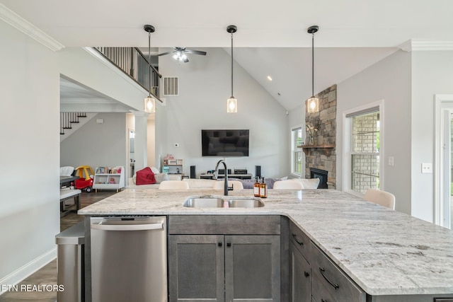 9337 Sandy Springs Ln, Knoxville, TN 37922 - kitchen with dishwasher, a sink, open floor plan, a fireplace, and dark wood finished floors