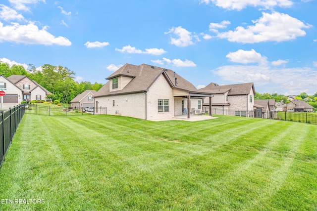 9337 Sandy Springs Ln, Knoxville, TN 37922 - rear view of property with brick siding, a patio area, and roof with shingles