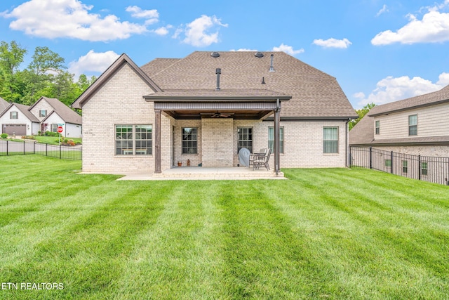 9337 Sandy Springs Ln, Knoxville, TN 37922 - rear view of property featuring ceiling fan, a patio area, brick siding, and a shingled roof