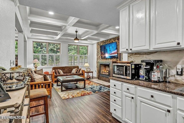 2464 Mountain Dr, Lenoir City, TN 37772 - living area with dark wood finished floors, coffered ceiling, beam ceiling, a ceiling fan, and recessed lighting