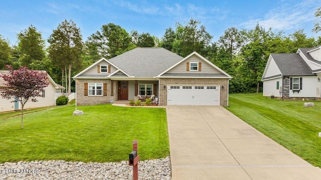 craftsman house featuring brick siding, a front lawn, concrete driveway, and an attached garage