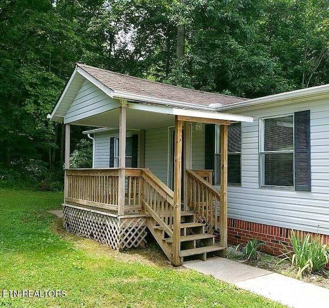 3497 Whittaker Rd, Cookeville, TN 38506 - view of front of property with a front lawn and a porch
