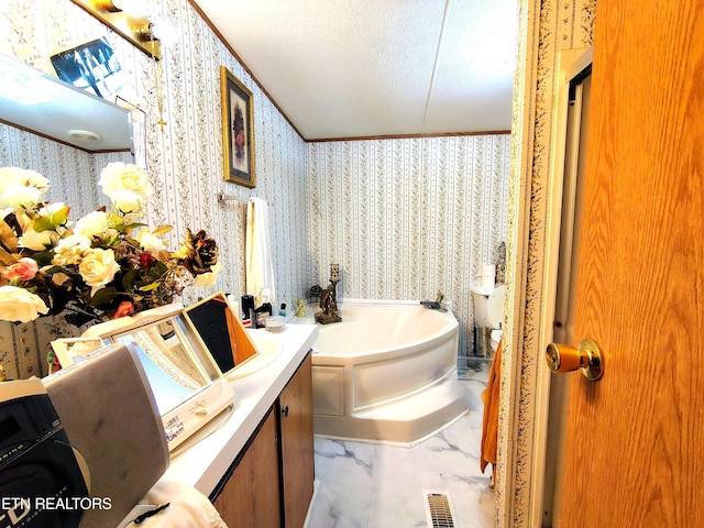 3497 Whittaker Rd, Cookeville, TN 38506 - full bath featuring wallpapered walls, a garden tub, marble finish flooring, and a textured ceiling