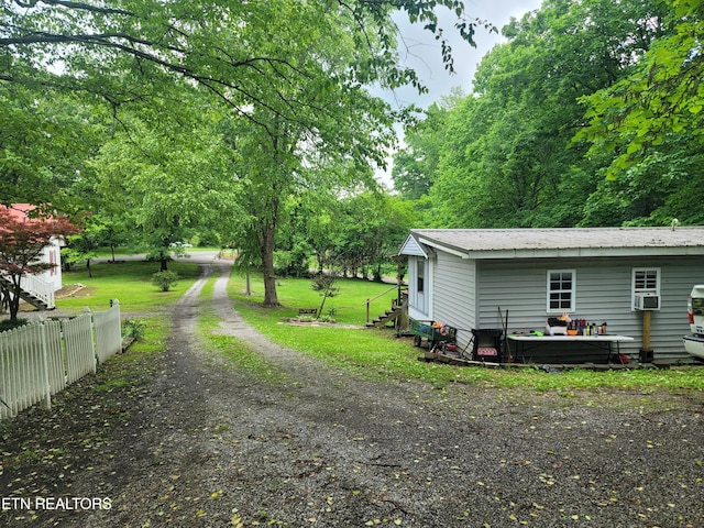 view of dirt / gravel driveway