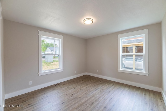 911 Valley Vista Dr, Loudon, TN 37774 - unfurnished room featuring wood finished floors and baseboards