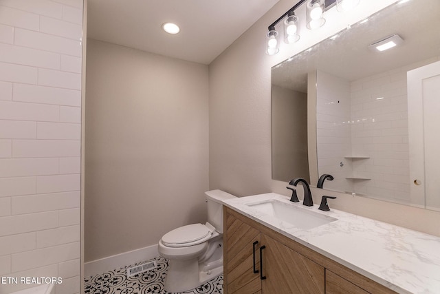 911 Valley Vista Dr, Loudon, TN 37774 - full bathroom featuring tile patterned floors, toilet, vanity, and baseboards