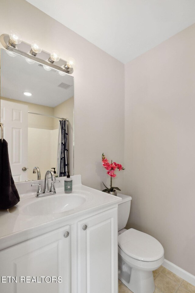 10737 Prince Albert Way, Knoxville, TN 37934 - full bathroom with vanity, tile patterned flooring, toilet, and baseboards