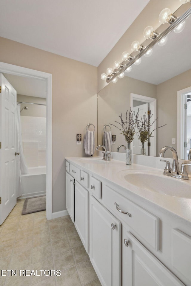 10737 Prince Albert Way, Knoxville, TN 37934 - bathroom with double vanity, tile patterned floors, and shower / bath combination