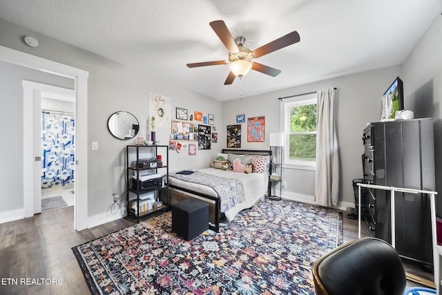 2007 NE Albert Ave, Knoxville, TN 37917 - bedroom with dark wood-type flooring, baseboards, and a ceiling fan