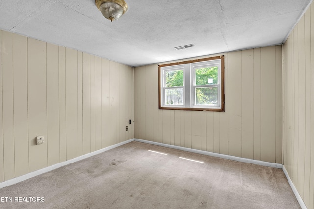 401 Offutt Spur Rd, Rocky Top, TN 37769 - carpeted spare room with a textured ceiling