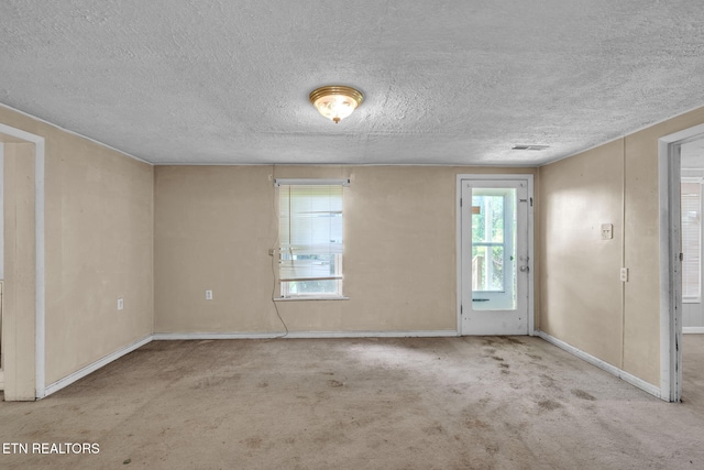 401 Offutt Spur Rd, Rocky Top, TN 37769 - carpeted empty room with a textured ceiling and baseboards
