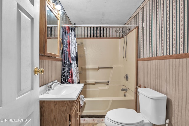 401 Offutt Spur Rd, Rocky Top, TN 37769 - bathroom featuring wallpapered walls, toilet, shower / bathtub combination with curtain, and vanity