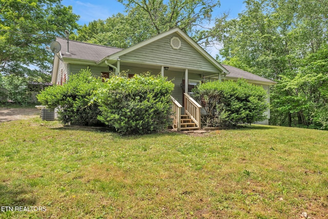401 Offutt Spur Rd, Rocky Top, TN 37769 - view of front facade featuring central air condition unit, a front yard, stairs, and a porch