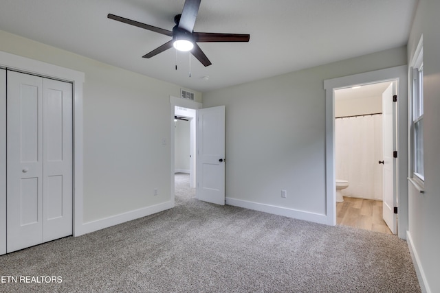 7513 Inverrary Cir, Knoxville, TN 37918 - unfurnished bedroom featuring carpet, a closet, ensuite bath, and baseboards