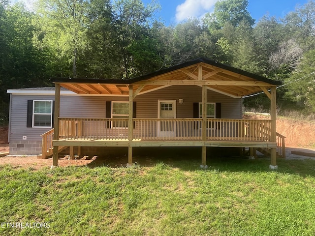1418 Gulley River Rd, Harrogate, TN 37752 - view of front of home with a deck, crawl space, and a front lawn