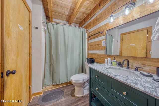 410 Sassafras Trl, Sevierville, TN 37876 - bathroom with wooden ceiling with exposed beams, toilet, vanity, wood finished floors, and a shower with curtain