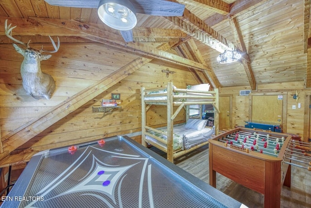410 Sassafras Trl, Sevierville, TN 37876 - bedroom featuring wood walls, wooden ceiling, and wood finished floors
