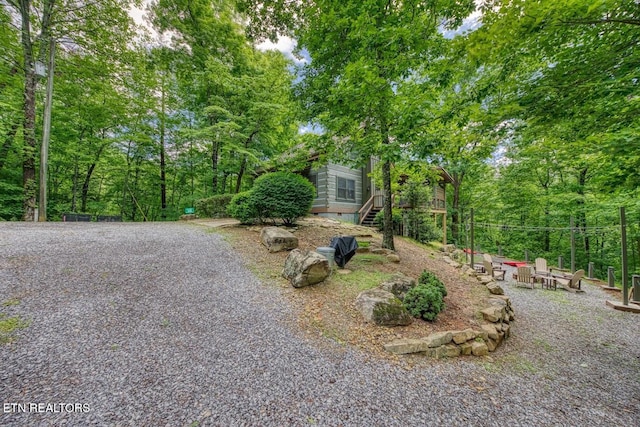 410 Sassafras Trl, Sevierville, TN 37876 - view of front of property featuring a fire pit and stairs