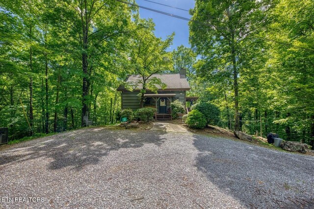 410 Sassafras Trl, Sevierville, TN 37876 - view of front of house with a chimney