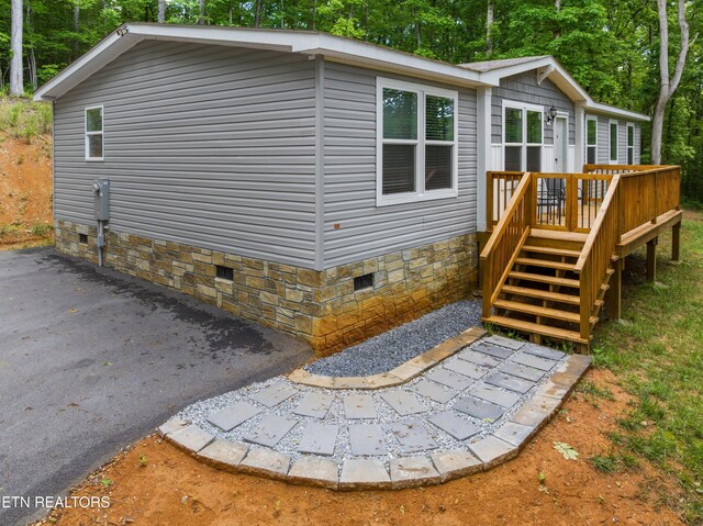 1452 Lower English Creek Rd, Newport, TN 37821 - back of house featuring crawl space, a wooden deck, and stairs