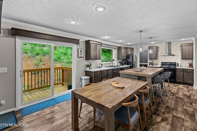 1452 Lower English Creek Rd, Newport, TN 37821 - dining space with dark wood-type flooring, ornamental molding, a textured ceiling, baseboards, and recessed lighting