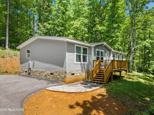 1452 Lower English Creek Rd, Newport, TN 37821 - manufactured / mobile home featuring a deck, crawl space, and stairs