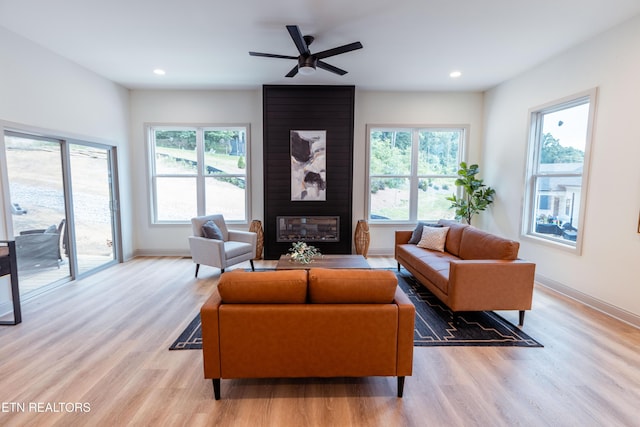 12516 Dalton View Ln, Knoxville, TN 37932 - living area featuring light wood finished floors, a fireplace, recessed lighting, and a ceiling fan