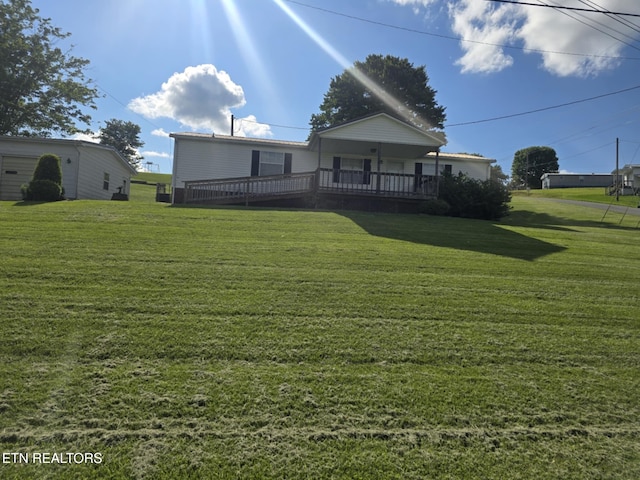 3023 Cave Springs Rd, Tazewell, TN 37879 - rear view of property featuring a yard and a wooden deck