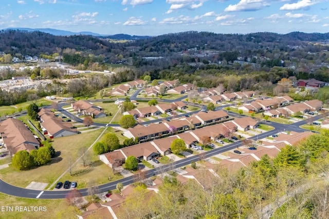 10008 Greylock Way, Knoxville, TN 37931 - aerial view of property and surrounding area with nearby suburban area, a forest, and a mountain backdrop