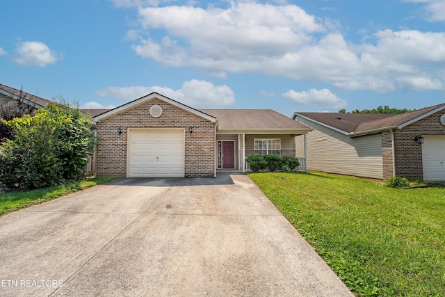 10008 Greylock Way, Knoxville, TN 37931 - single story home featuring brick siding, a garage, concrete driveway, and a front yard