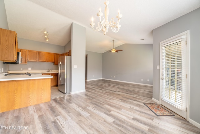 10008 Greylock Way, Knoxville, TN 37931 - kitchen with freestanding refrigerator, lofted ceiling, open floor plan, light wood finished floors, and a ceiling fan