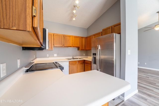 10008 Greylock Way, Knoxville, TN 37931 - kitchen featuring stainless steel fridge, a sink, light countertops, vaulted ceiling, and electric range
