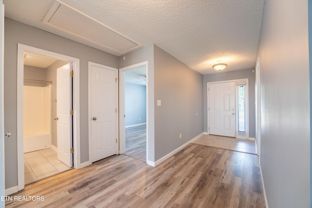 10008 Greylock Way, Knoxville, TN 37931 - entryway featuring light wood finished floors, baseboards, and a textured ceiling