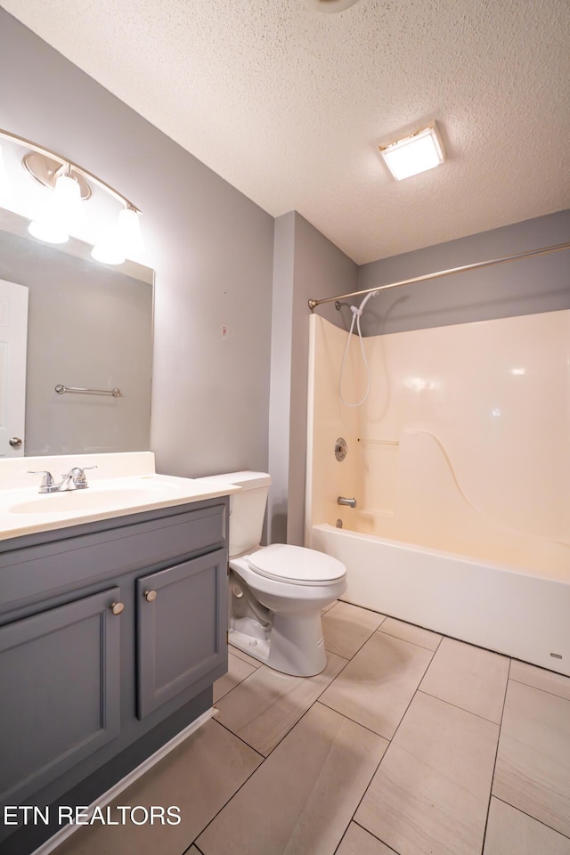 10008 Greylock Way, Knoxville, TN 37931 - bathroom with shower / washtub combination, vanity, toilet, a textured ceiling, and tile patterned flooring