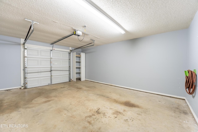 10008 Greylock Way, Knoxville, TN 37931 - garage with a garage door opener and baseboards