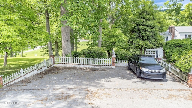 gate with view of scattered trees