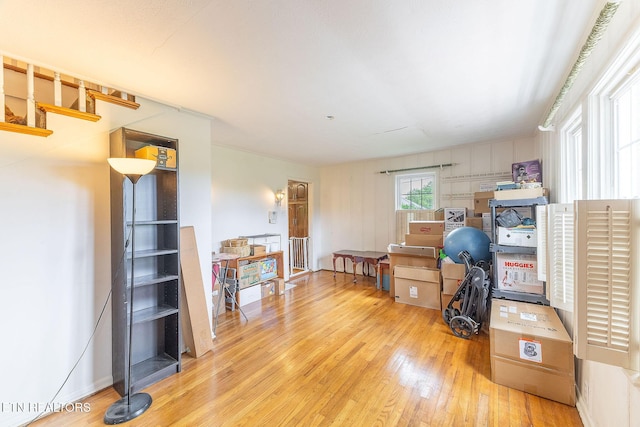 home office with wood-type flooring