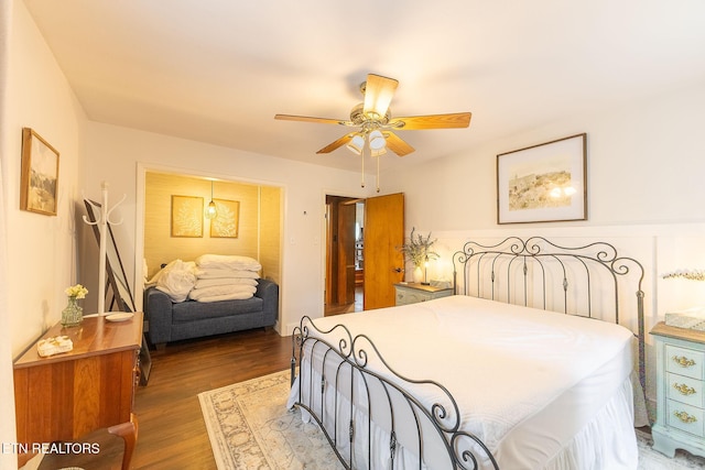bedroom with wood finished floors and ceiling fan
