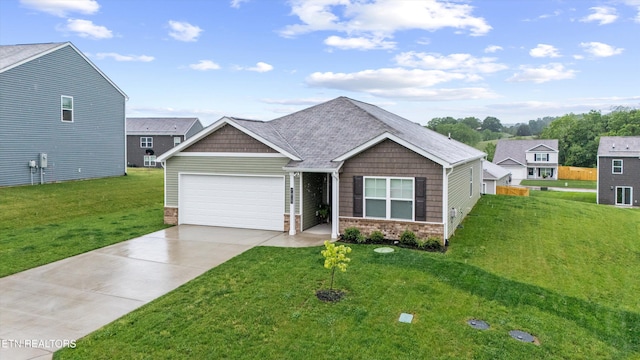 7813 Night Shade Ln, Knoxville, TN 37938 - view of front facade featuring an attached garage, concrete driveway, a front yard, and stone siding