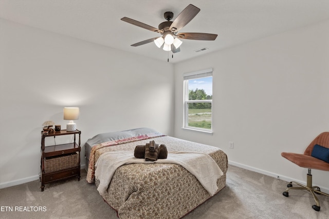 7813 Night Shade Ln, Knoxville, TN 37938 - bedroom featuring light carpet, baseboards, and ceiling fan