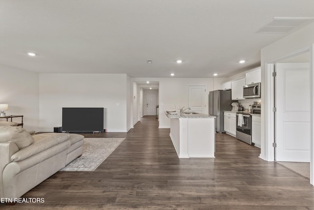 7813 Night Shade Ln, Knoxville, TN 37938 - living room featuring recessed lighting and dark wood-style flooring