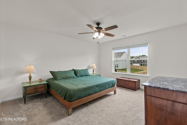 7813 Night Shade Ln, Knoxville, TN 37938 - bedroom featuring light carpet, baseboards, and ceiling fan