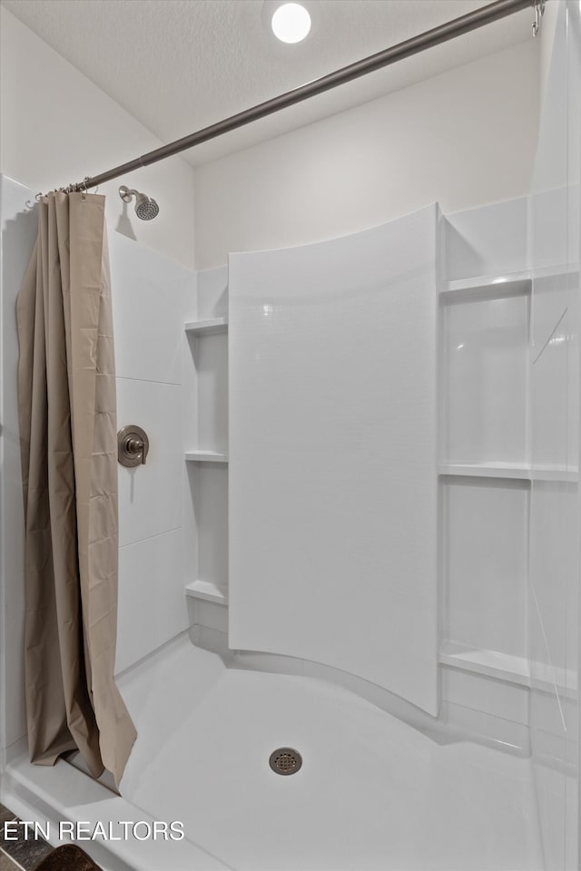 7813 Night Shade Ln, Knoxville, TN 37938 - bathroom with a stall shower