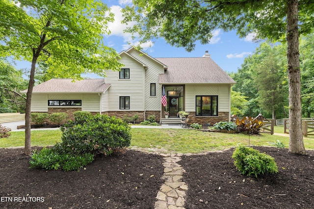 12771 Tanglewood Dr, Knoxville, TN 37922 - view of front of house with a chimney, a shingled roof, and stone siding