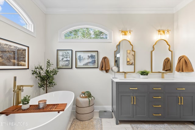 12771 Tanglewood Dr, Knoxville, TN 37922 - bathroom featuring double vanity, a soaking tub, ornamental molding, and baseboards