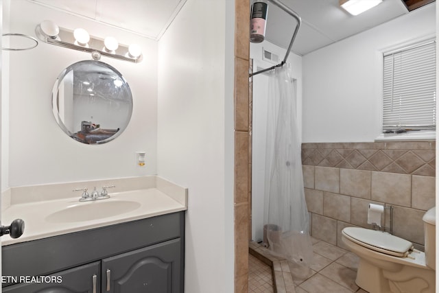 12771 Tanglewood Dr, Knoxville, TN 37922 - bathroom featuring tile walls, tile patterned floors, toilet, a shower with curtain, and vanity