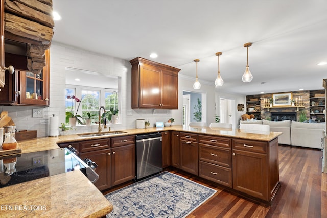 12771 Tanglewood Dr, Knoxville, TN 37922 - kitchen featuring stainless steel dishwasher, a sink, a peninsula, dark wood-type flooring, and tasteful backsplash